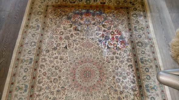A £3,000 silk rug where the colours have migrated after a DIY clean — this is not reversible